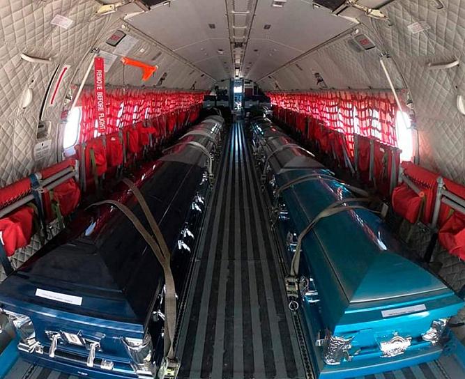 MEXICO REPATRIA CUERPOS DE MIGRANTES MUERTOS EN TRAILER EN TEXAS 